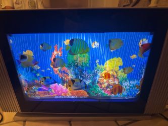 Fish aquarium, realistic rotating scenery