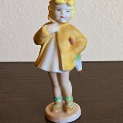 Vintage 50s Blonde Girl Raincoat Green Cap Ceramic Figurine