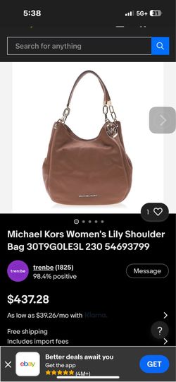 Micheal Kors hand bag and watch.