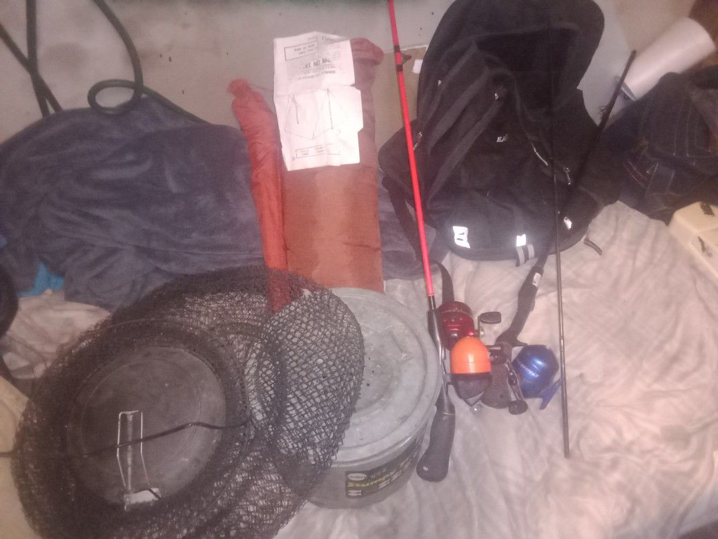 Camping Stuff Three Reels Two Rods A Basket Minnow Bucket And Tent
