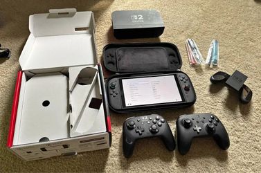 Nintendo Switch 2 with Original Box and 2 Controllers + Carrying Case