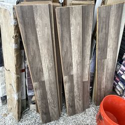 7 cs 168 sq fts $17 each we selling all 7 boxes cs store $27    We locate Hesperia  pickup only cash Grey Oak 7 mm T x 8 in. W Laminate Wood Flooring 