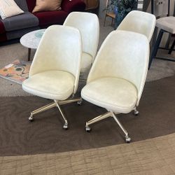 Set Of 4 Vintage Cream Color Rolling Chairs