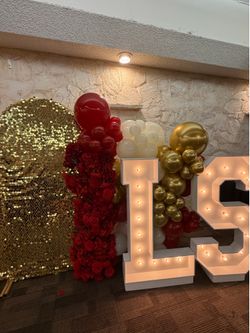 Gold sequence with flower arrangements