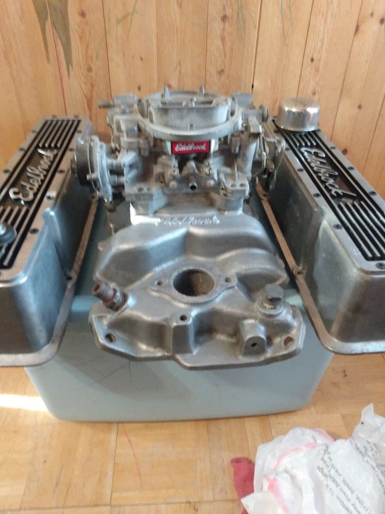 Edelbrock- Carb. Intake,And Tall Valve Cover