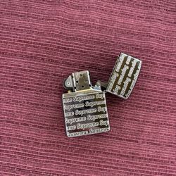 Supreme Repeat Engraved Zippo