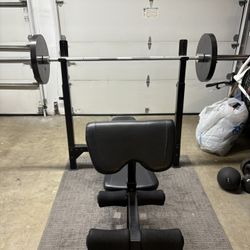 Bench Press With Olympic Bar And Weights 