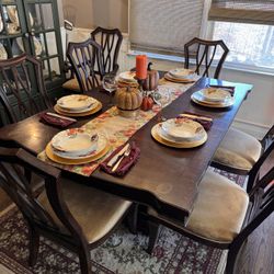 Solid Wood Dining Table And 8 Cushioned Chairs. 