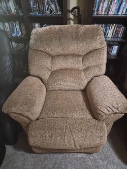 Two free chairs, one reclines one doesn't work, both electric,  free to pick up