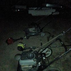 Two lawn mowers to weed eaters