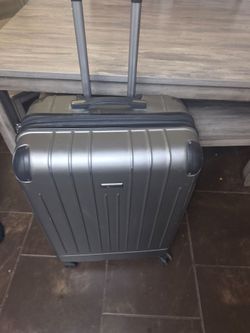 Hard Shell Spinner Carry-On Suitcase – $20
