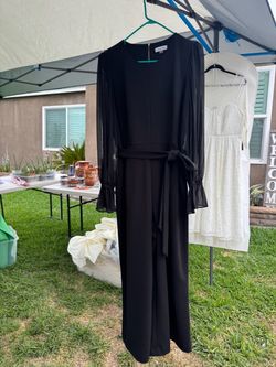 $25-USED CALVIN KLEIN BLACK ROMPER SIZE 16