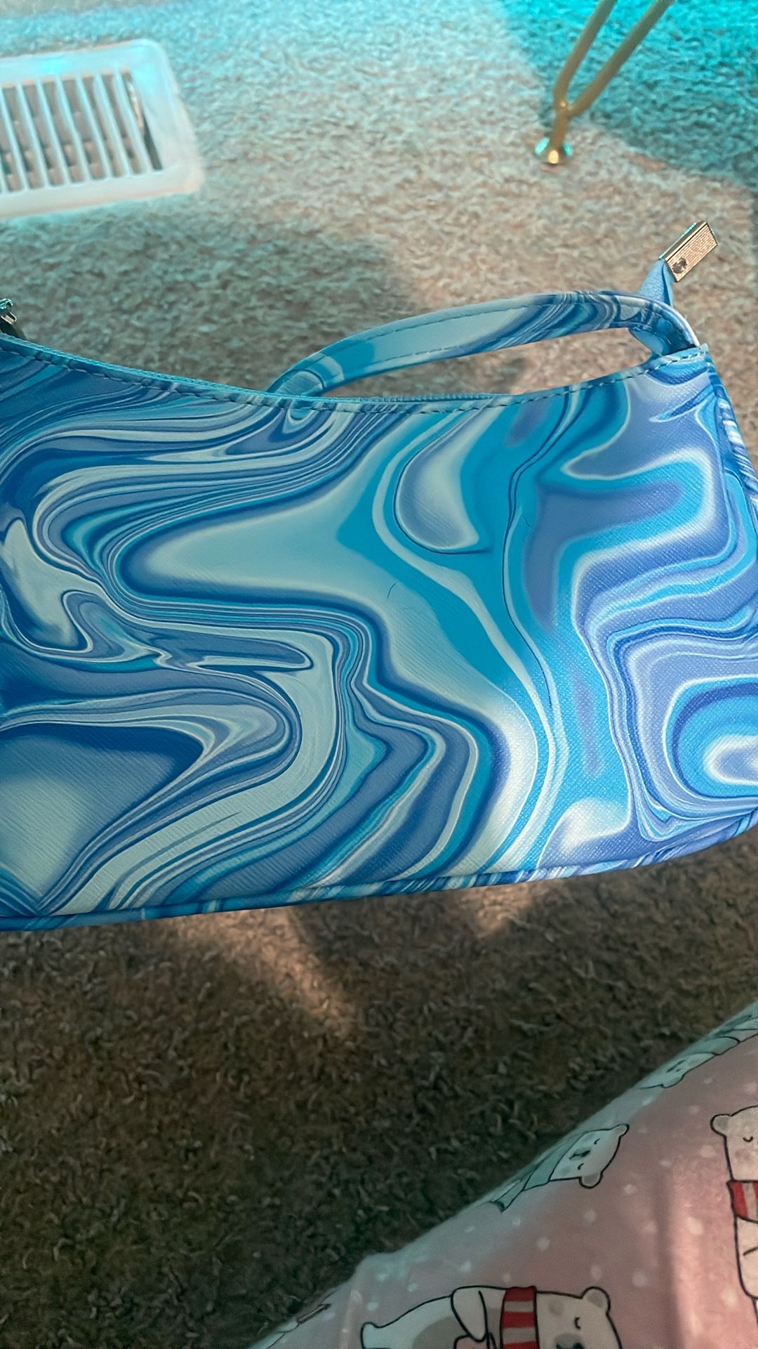 A Blue And White Swirl Shoulder Bag