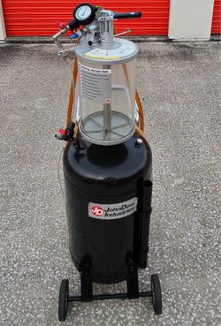 This is a JohnDow Industries 20-gallon fluid evacuator (likely model JDI-20EV or JDI-20COMBO) designed for removing used oil and other non-flammable f
