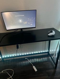Gaming monitor, desk and gaming chair