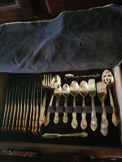Macys Beautiful gold set of utensils service of 12