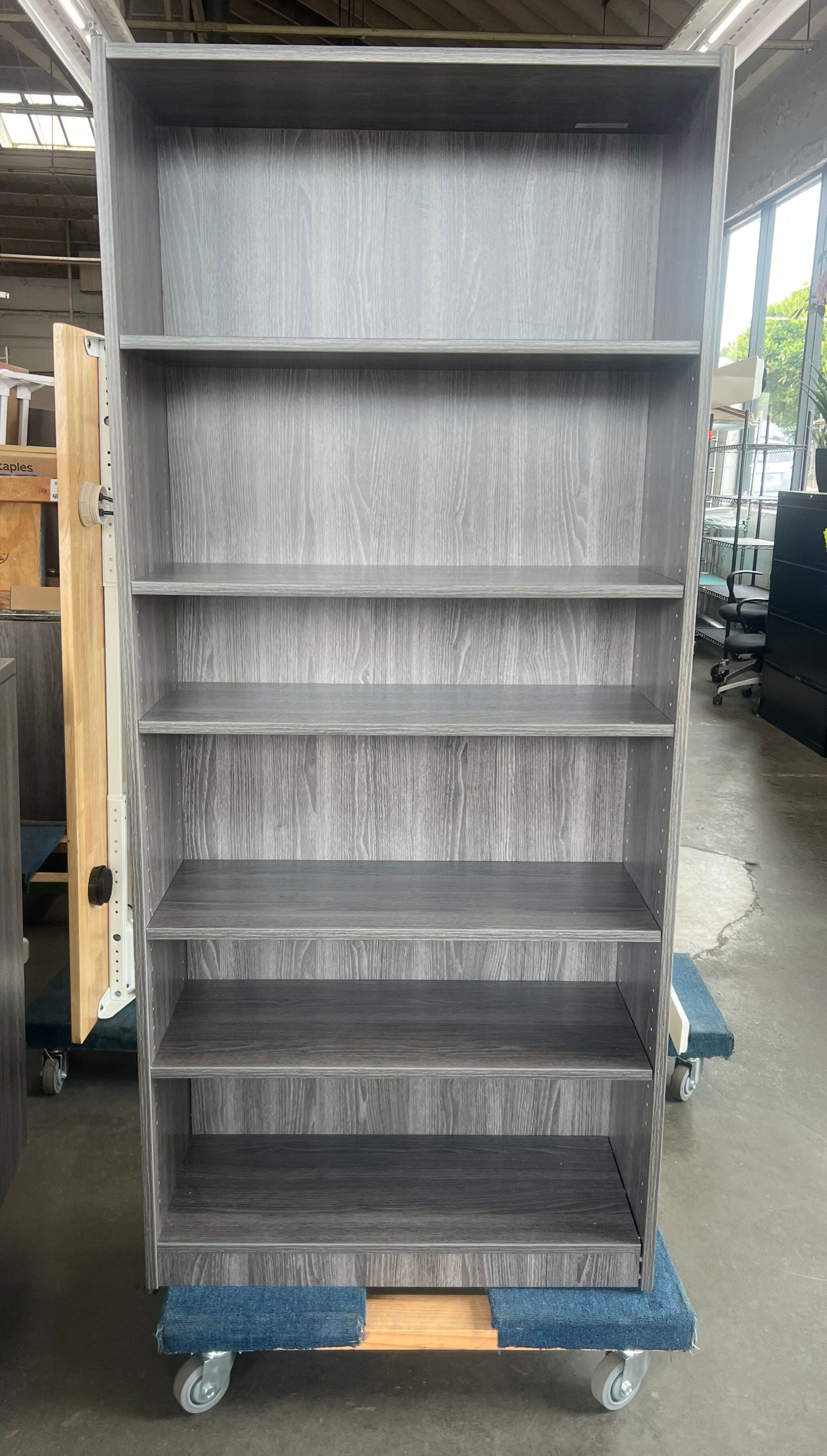 Tall Gray Laminate Bookshelves