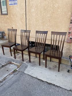 Solid dark wood dining table chairs