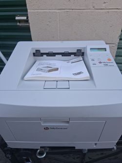 TallyGenicom 9330N laser printer. Printer and toner are both new