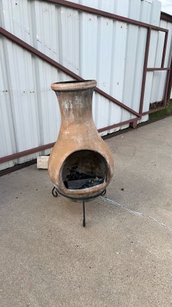 clay chiminea / outdoor fireplace