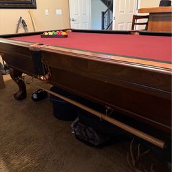 Connelly pool table and cues.
