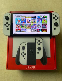 NINTENDO SWITCH OLED + 7500 GAMES