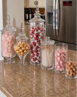 Set of 6 Decorative Glass Apothecary Jars Beautiful set of six clear glass decorative jars in various styles and sizes. Perfect for candy, treats, ba