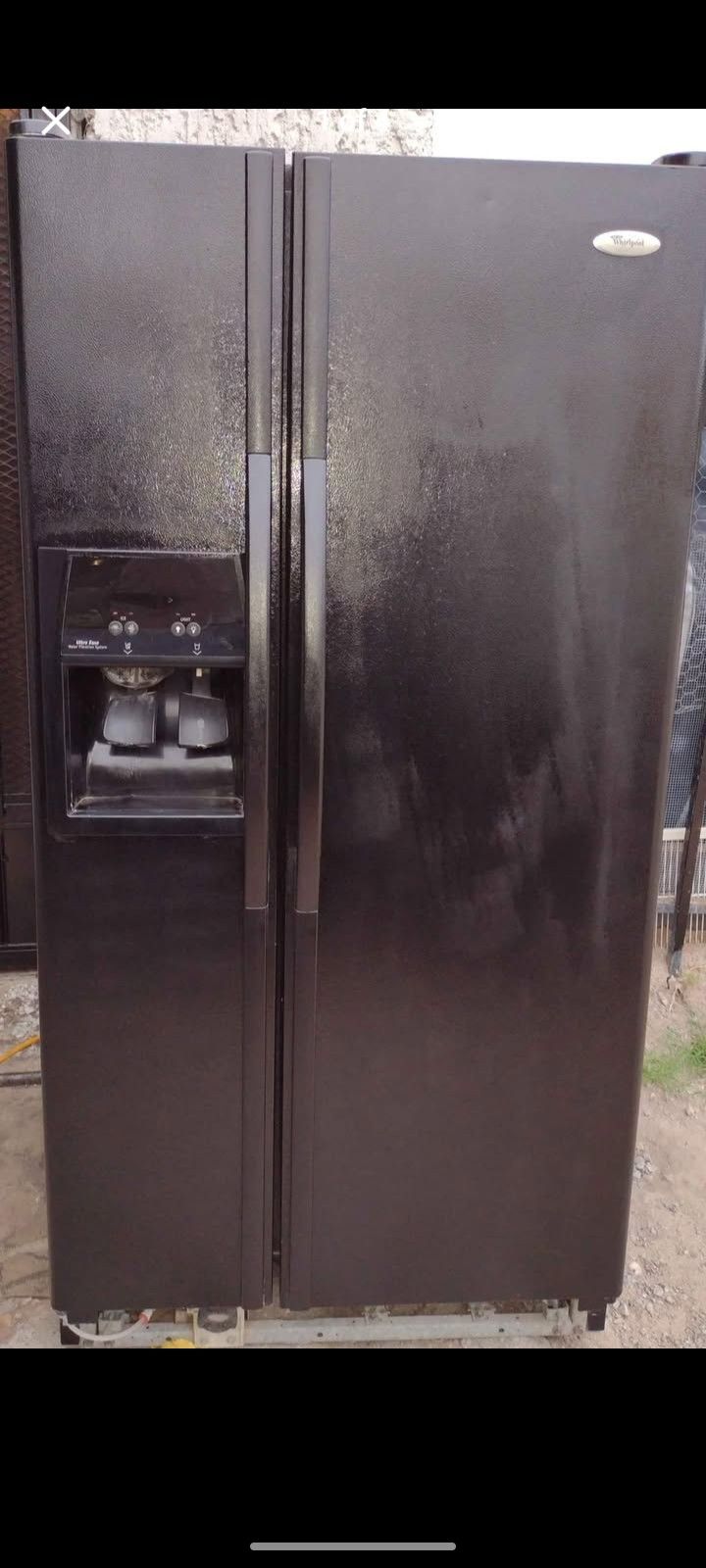 Whirlpool Side By Side Refrigerator $550.00
