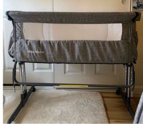 Mika micky bassinet bedside
