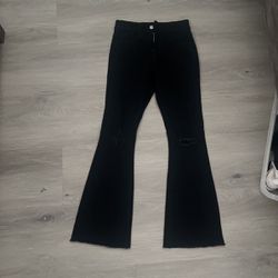 Black flared jeans. Size: teen 13y