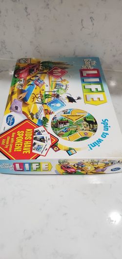 The Game of Life Game, Family Board Game for 2 to 4 Players, for Kids Ages  8 and Up, Includes Colorful Pegs - Hasbro Games