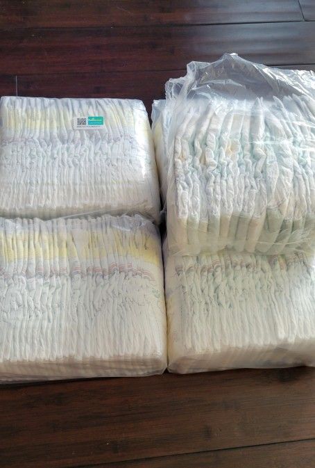 Pampers Size: 4 (94 Reg. & 28 Overnight) Total 122