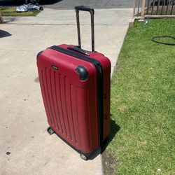 $45 red 28” Kenneth Cole Reaction hardshell lightweight suitcase luggage with spinner wheels and a retractable handle,