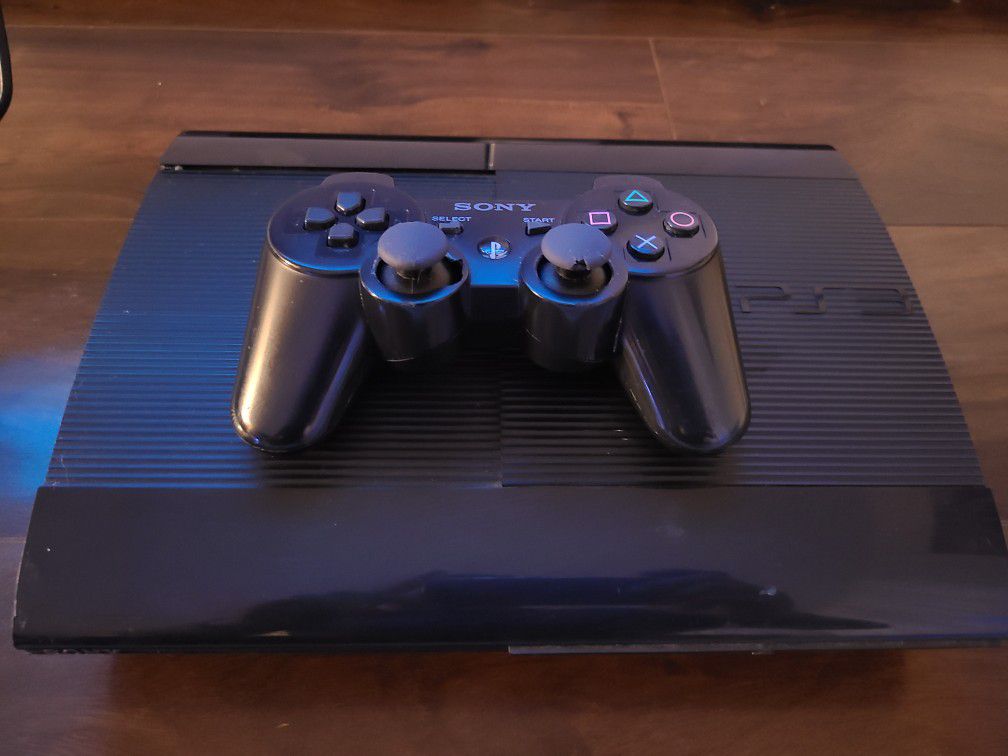 PS3 Slim with 5 games + external HD