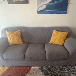 Free Leather Pull out Couch with Grey Cover and Throw pillows 