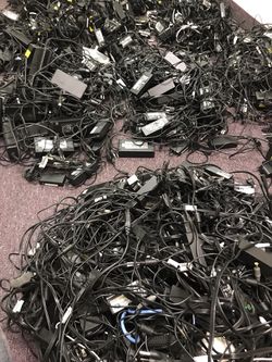 Assorted laptop chargers in large quantities. Hp, dells, toshiba, Lenovo, Sony, Samsung, and all kinds of laptop chargers. Pc power cable, vga, usb,