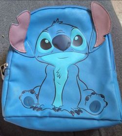 Stitch purse backpack