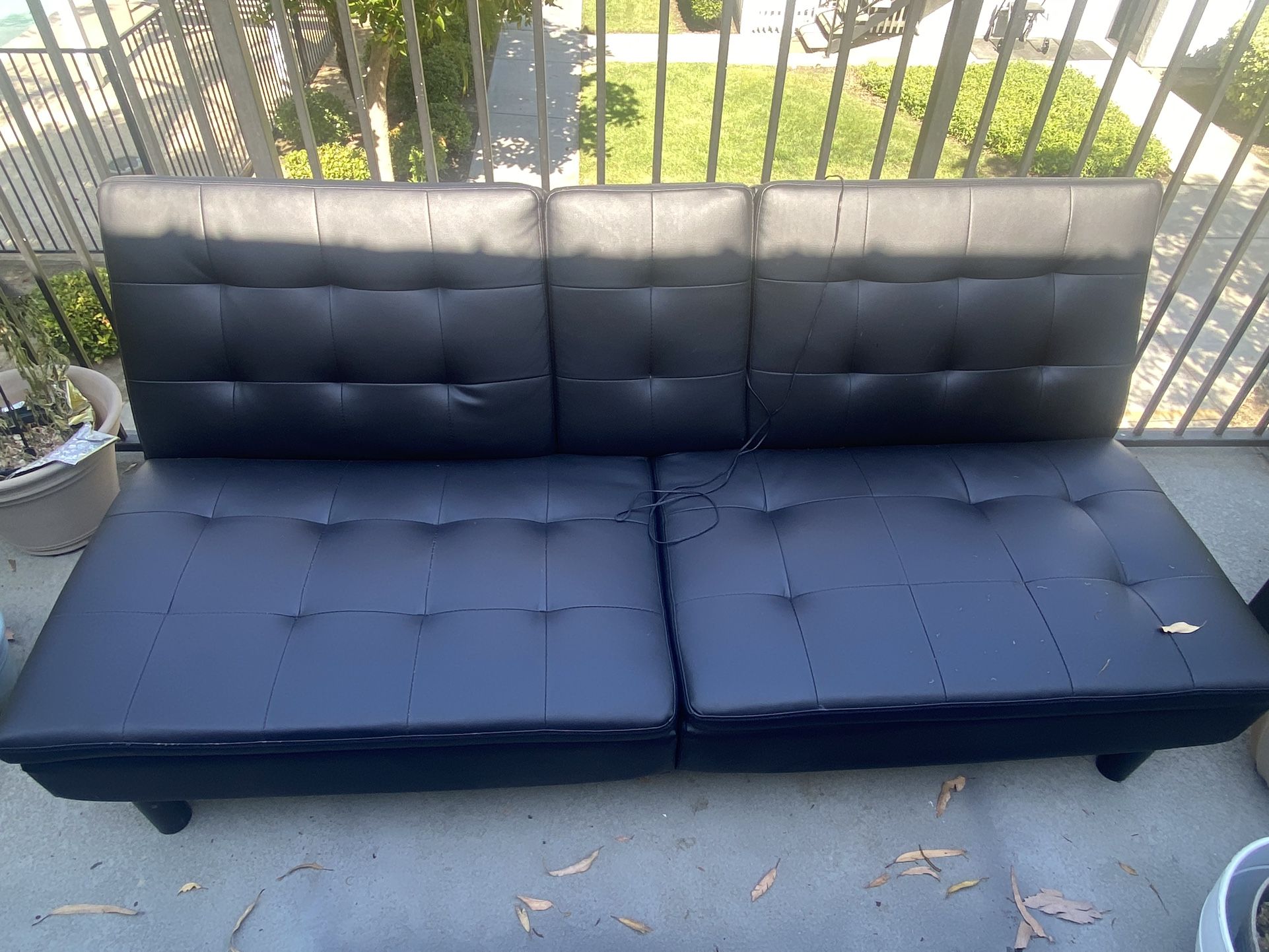 Black Sofa With Two Cup Holders And USB Connection