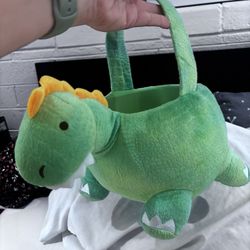 Plush dinosaur Halloween basket from spirit Halloween store