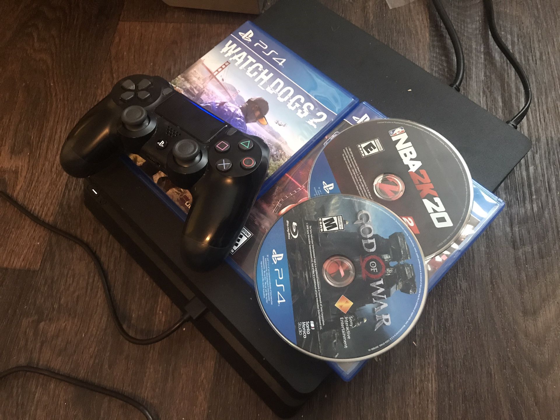 PS4 Slim with 2k20 and God of War and Watch dogs 2