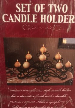 Set of 2 rod iron candle holders (new in box)