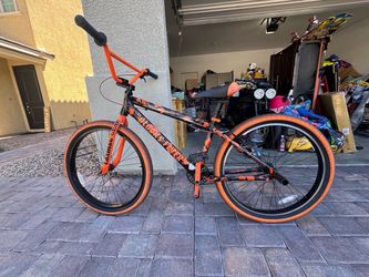 Flyer SE bike camouflage orange and black