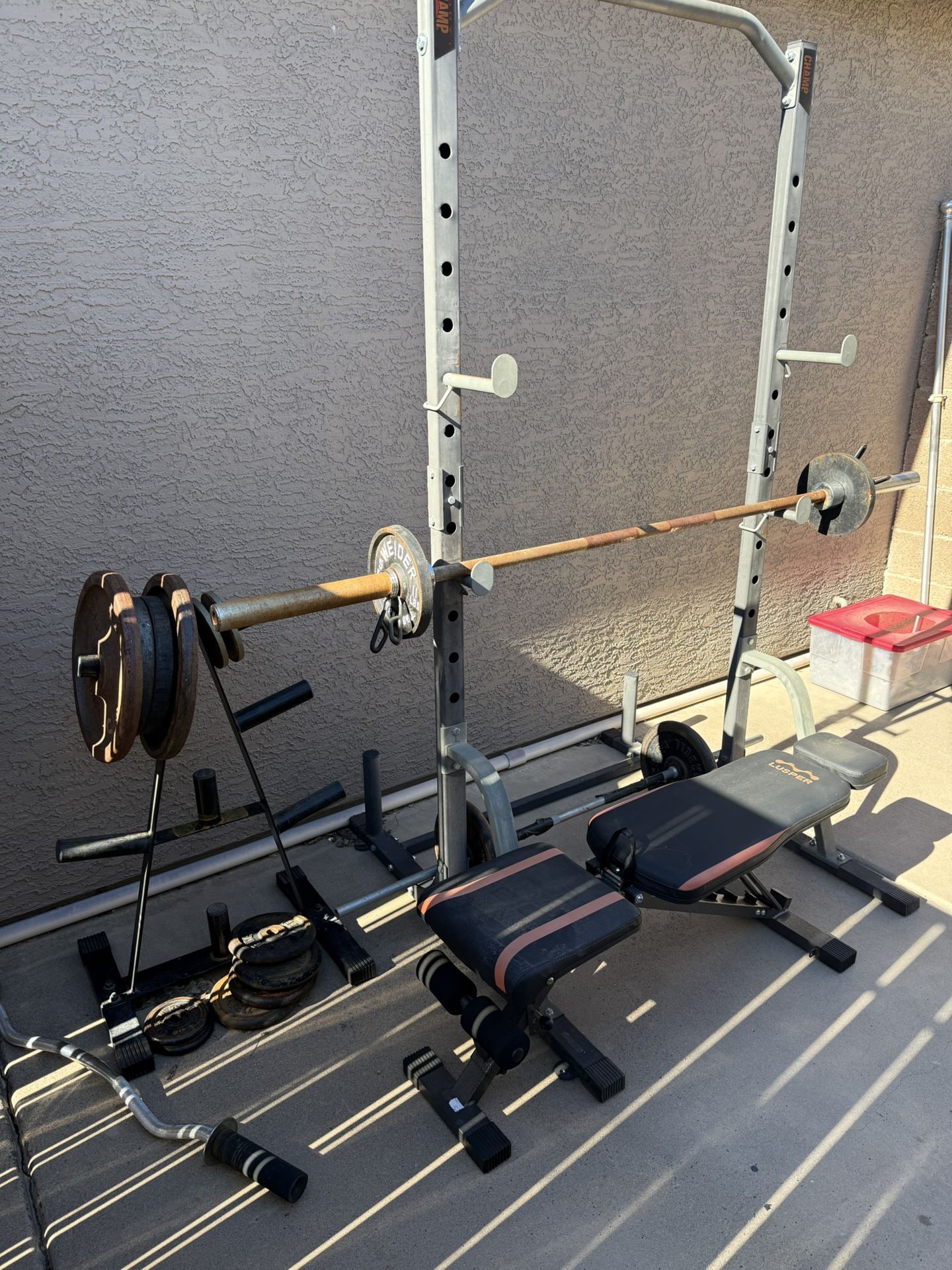 Squat Rack, Weights,bars, And Bench