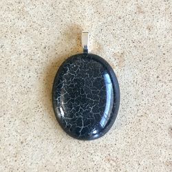 ⚫️ Pretty black oval pendant with metallic design made from a vintage, plastic cabochon