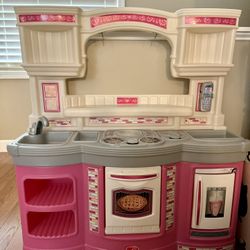Step2 Play Toy Kitchen In Excellent condition $30 Cash Pickup In Apex Always kept indoors, comes with pretend toy phone that snaps on,  storage in the