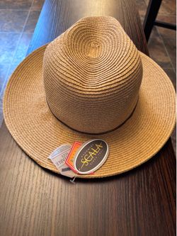 Women’s Scala beach hat wide brim with 50+ Uv protection and an adjustable inside band up or down 3 sizes