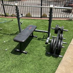 Weight Bench + Olympic Barbell + Rack + Plate Holder + 240 Lbs Of Rubber Olympic Weight Plates
