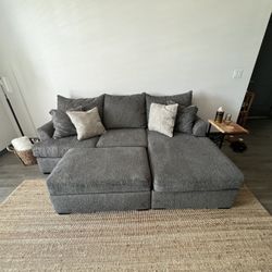 Dark Grey Reversible Sectional Couch w/ Ottoman