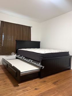 Queen bed and trundle and mattresses