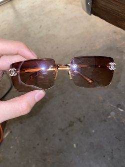 Iced out Chanel sunglasses